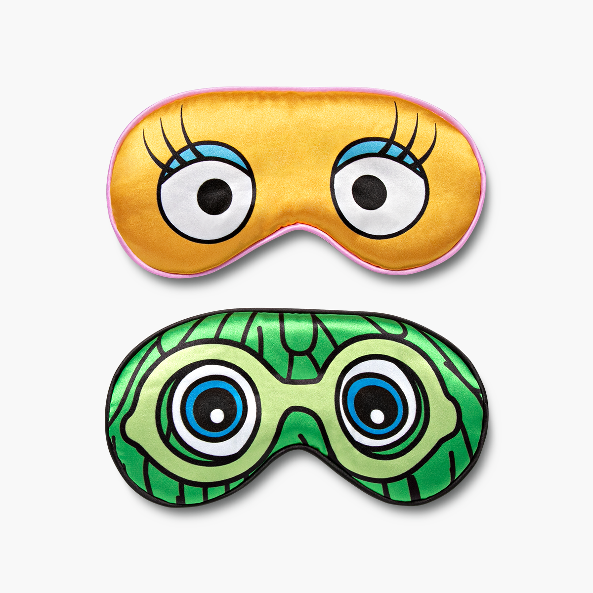 Set of 2 sleep masks. 1 Yellow mask featuring Birdie's eyes and lashes and 1 Green mask featuring the green Fry Friend's wacky hair, eyes and goggles.