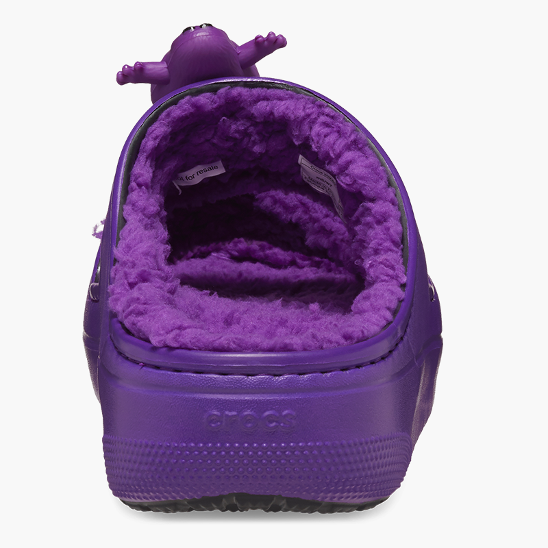 Back view of fuzzy grimace Cozzzy sandal