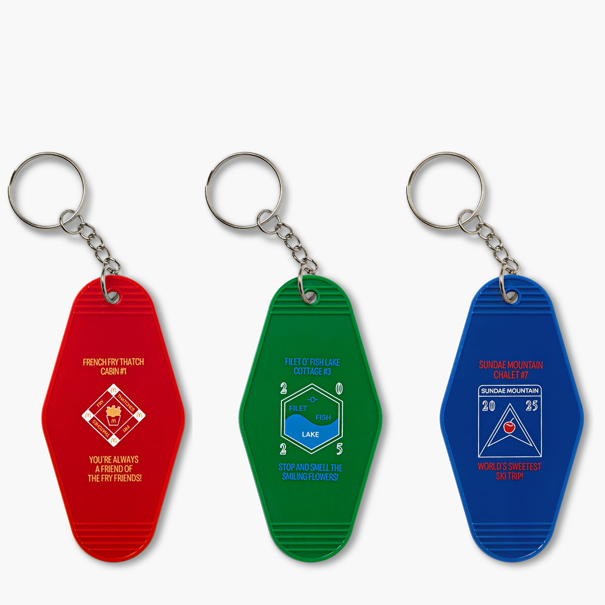 Full set: Set of 3 McDonaldland keychains in red, green and blue featuring French Fry Thatch, Sundae Mountain and Filet-O-Fish Lake