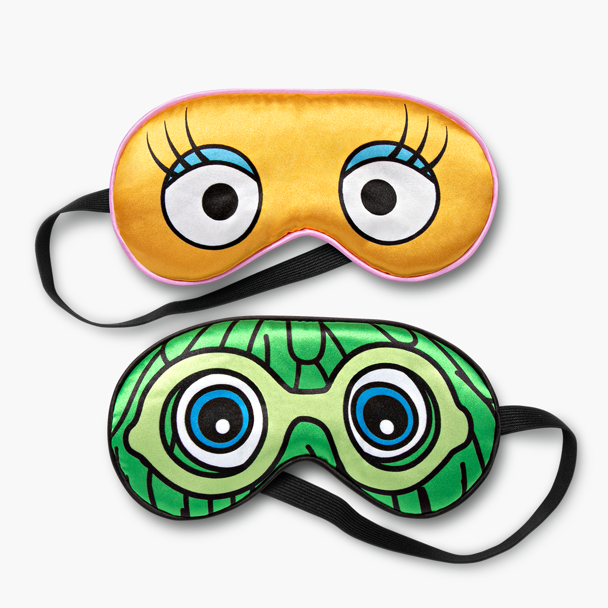 Set of 2 sleep masks with black strings. 1 Yellow mask featuring Birdie's eyes and lashes and 1 Green mask featuring the green Fry Friend's wacky hair, eyes and goggles.
