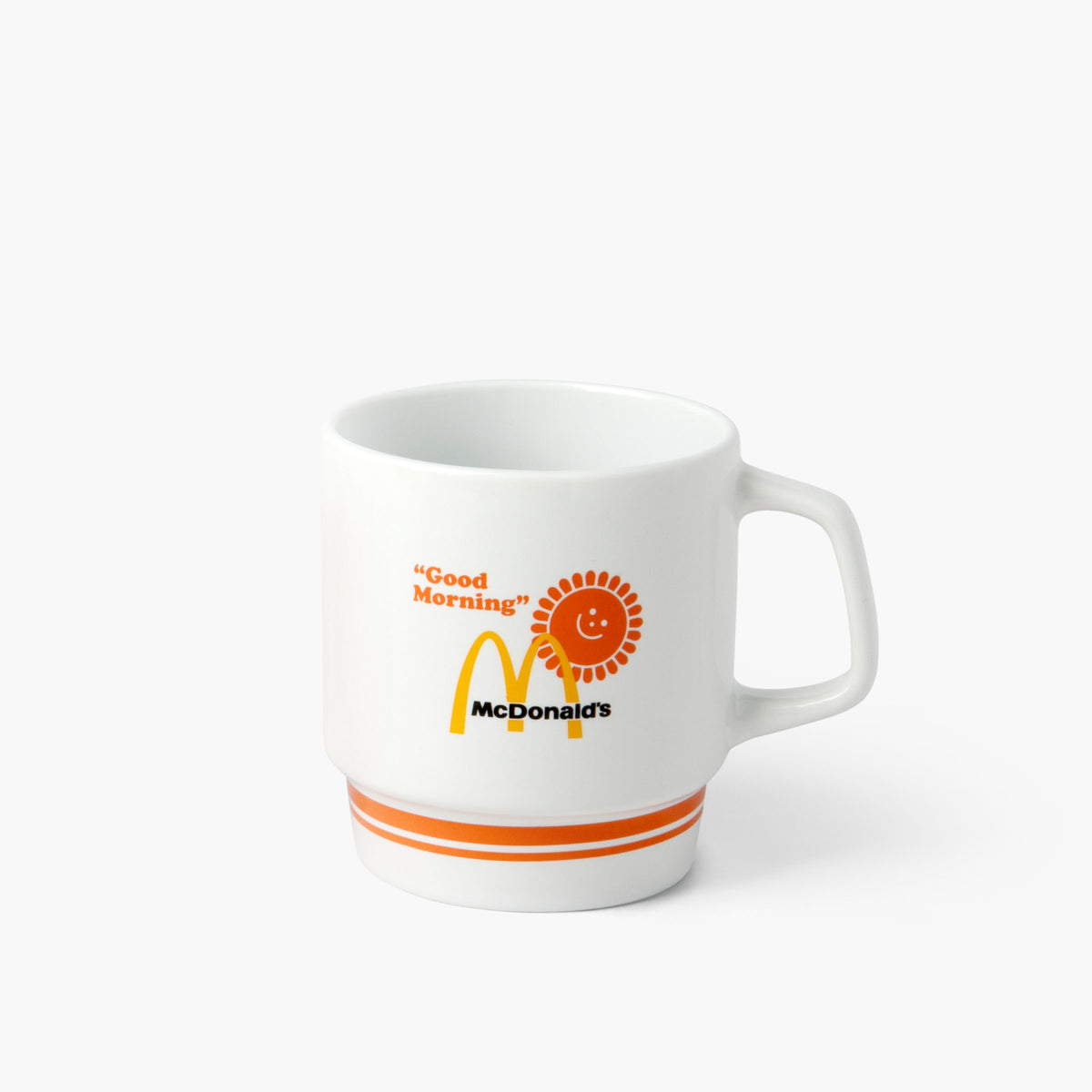 Full view of white retro mug with McDonald’s logo and orange “Good Morning” text next to smiling sun