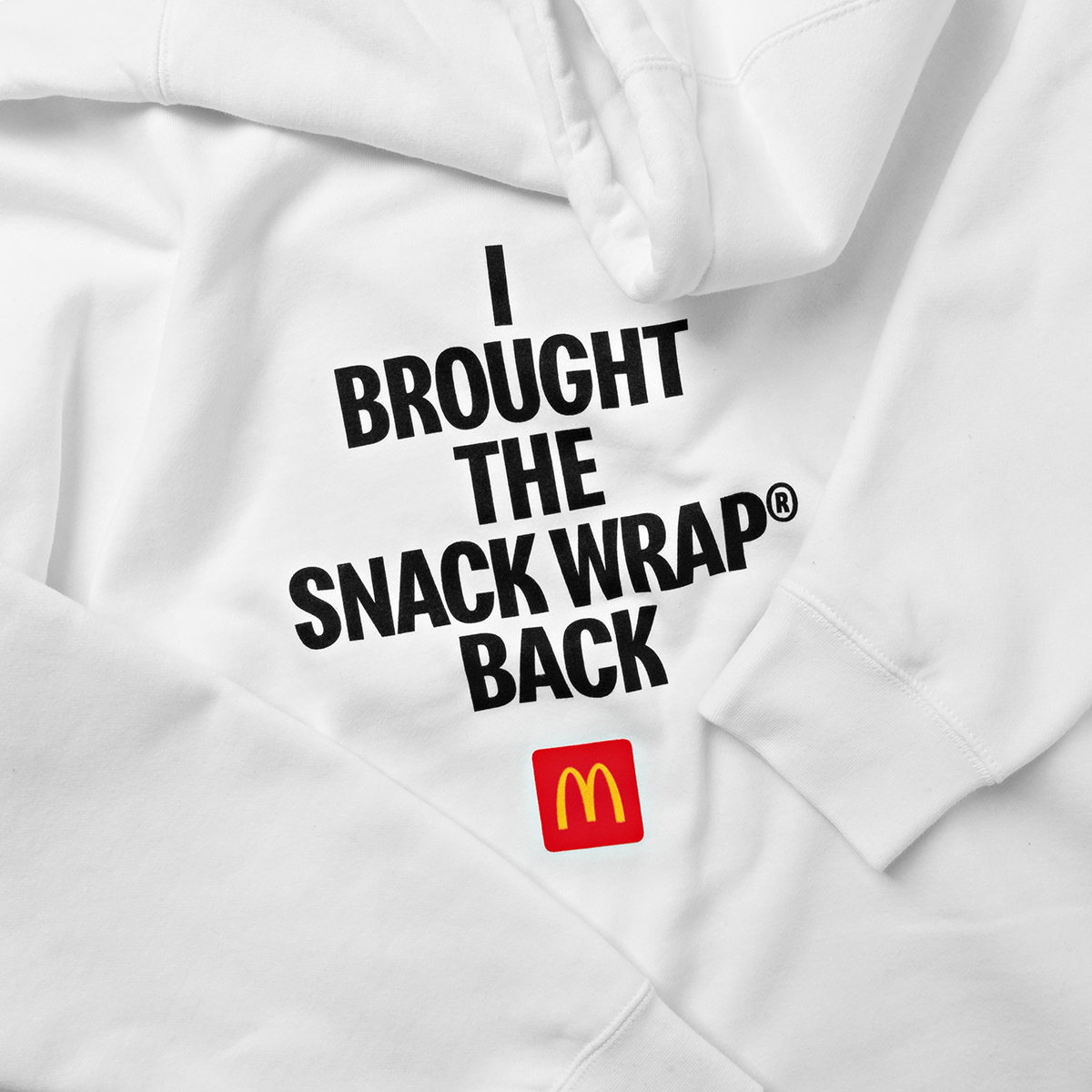View Close-up of words “I Brought the Snack Wrap® Back” printed in black and McDonald’s logo underneath