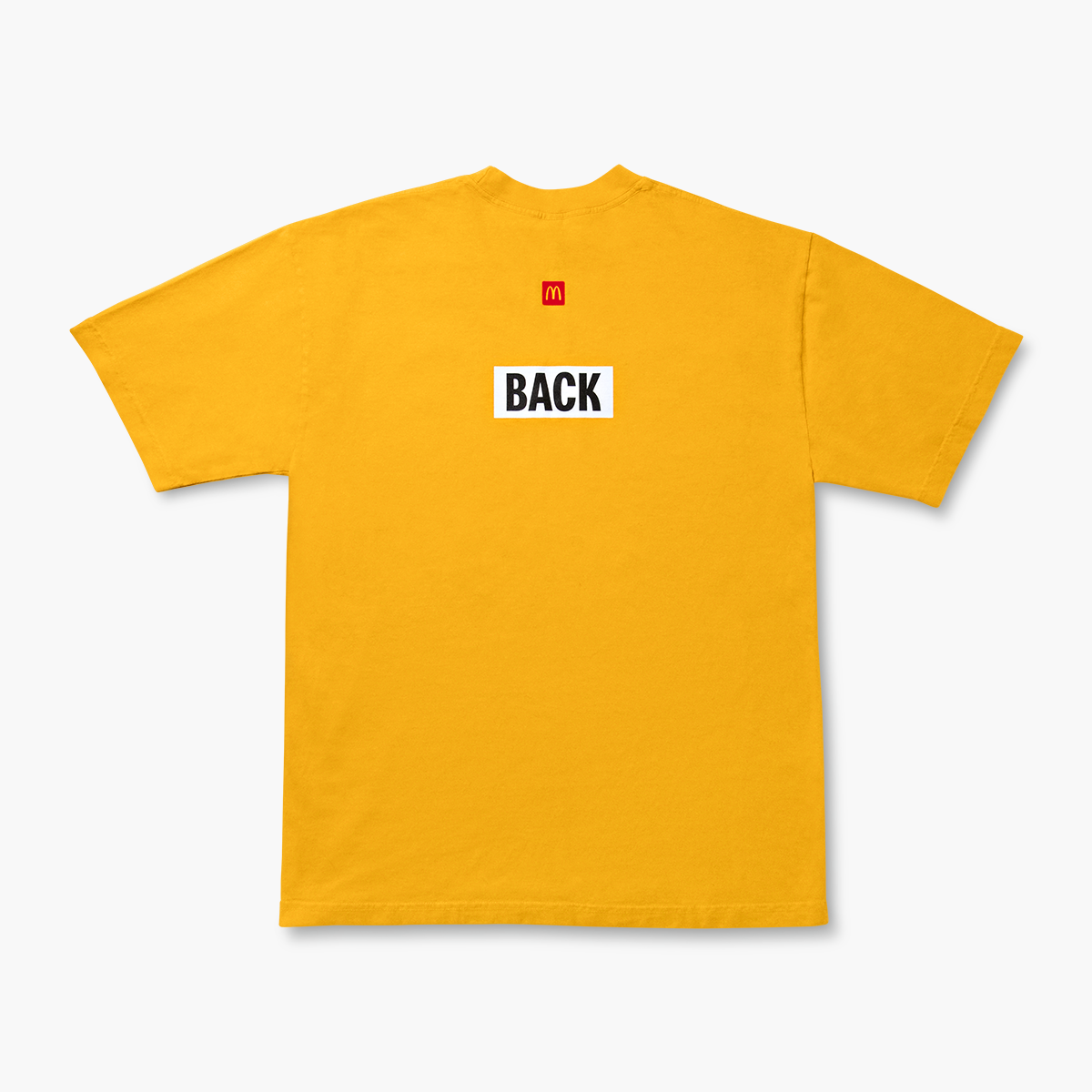 Back of T-shirt with word “Back” printed in black across upper back