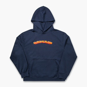  Front view of navy blue hoodie with "McDonaldland" printed across upper chest in a bold red and gold vintage font