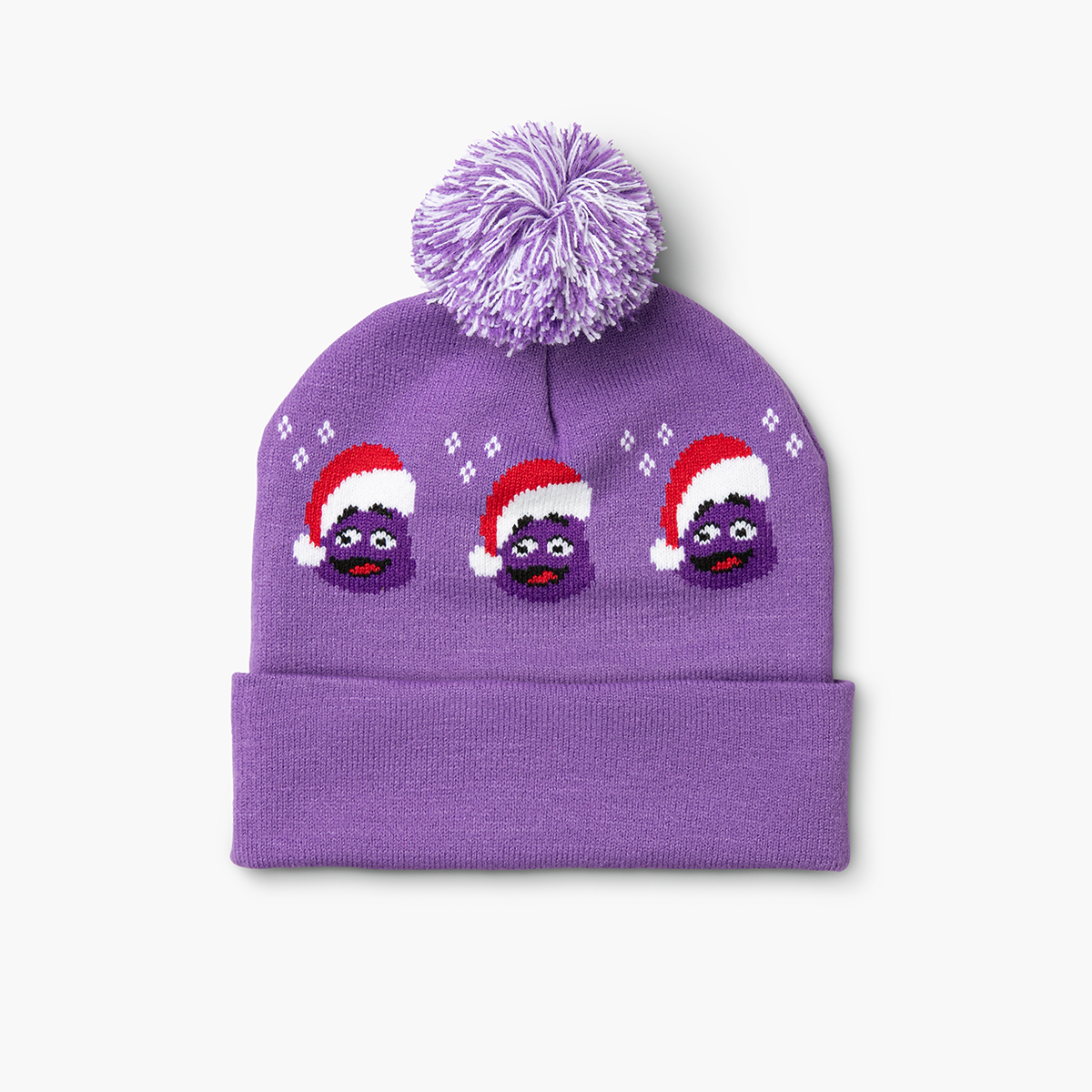 Back of purple and white pom beanie with repeating Grimace pattern and dual-color pom on top.
