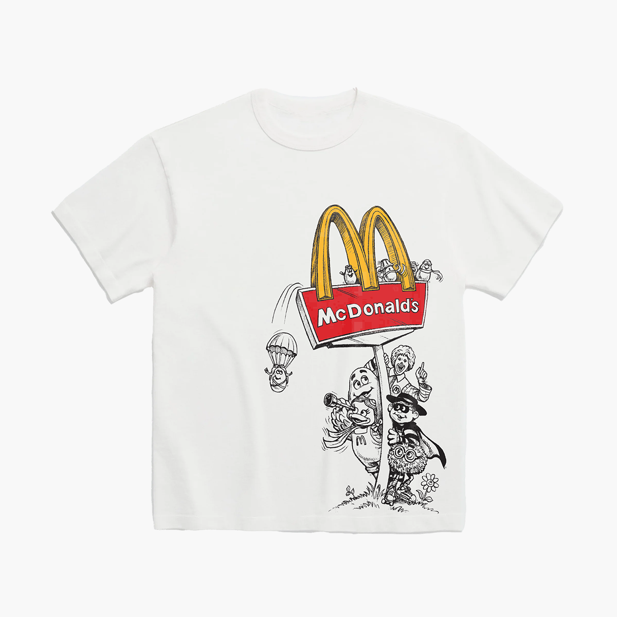 Front View: A white short-sleeve crewneck t-shirt featuring a graphic print of the McDonald's golden arches logo with a red sign and a black-and-white cartoon illustration of McDonaldland characters.