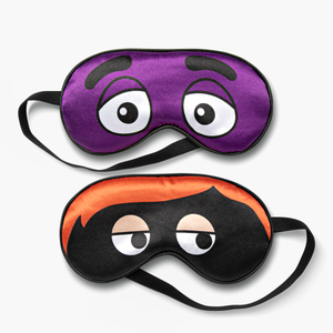 Set of 2 sleep masks with black straps. 1 Purple mask featuring Grimace's eyes and 1 black mask featuring Hamburglar's orange hair and masked eyes.