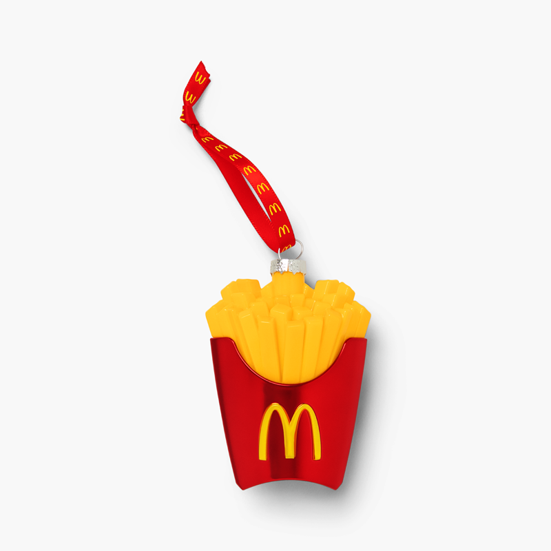 French fry ornament featuring a bright red McDonald's box with golden fries on top with red string