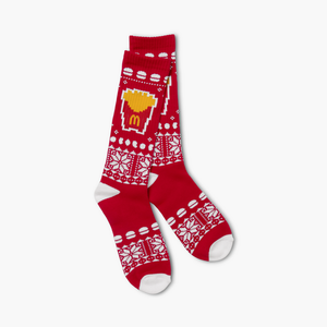 Red and white knit socks featuring burgers, fries, and snowflakes