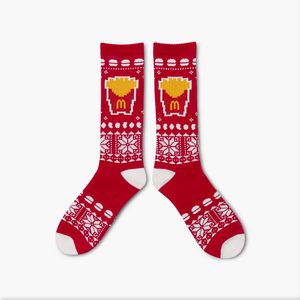 Red and White knit socks featuring burgers, fries, nuggets, and snowflakes