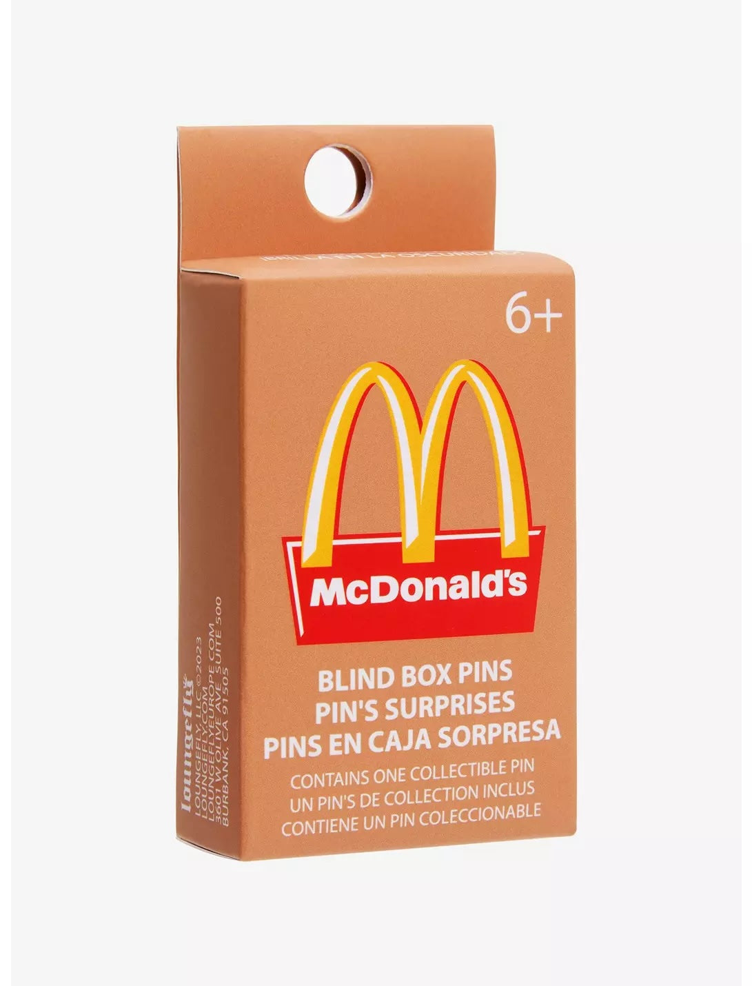 The cardboard box features the McDonald’s Golden Arches logo and states that it is intended for ages 6 and up. The box contains one collectible pin."