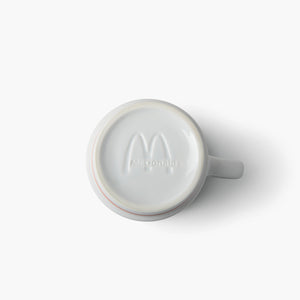 Bottom of mug with white engraved McDonald’s logo