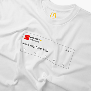 View shirt with close-up of McDonald’s “X” post that reads “snack wrap 07.10.2025”