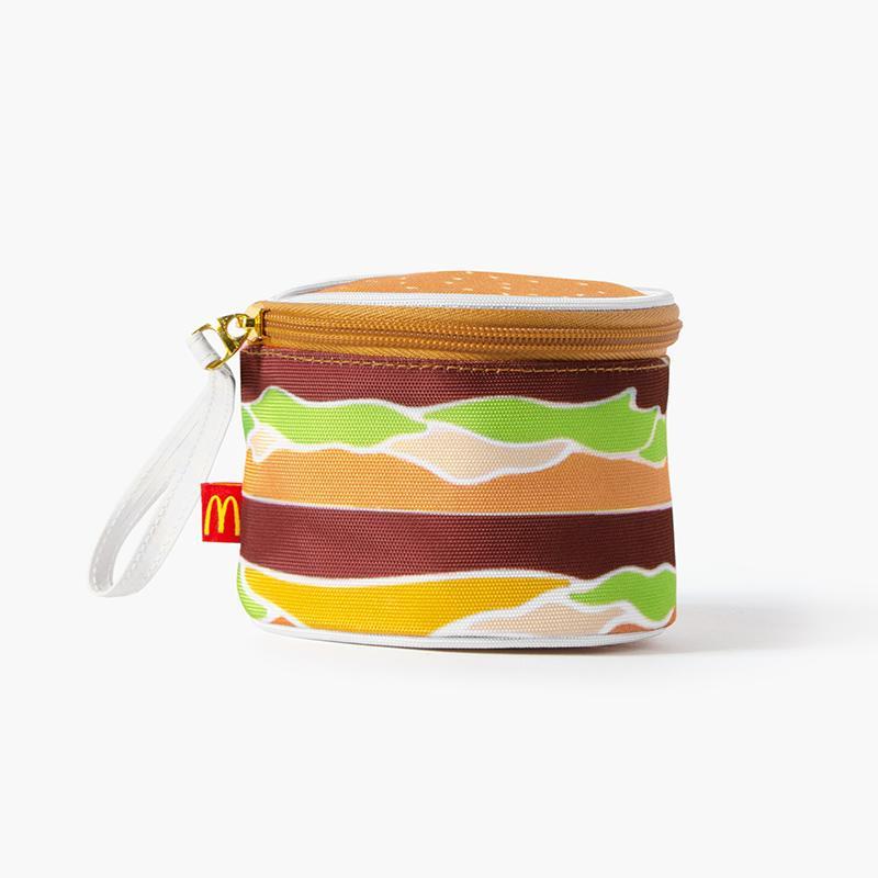 small round zippered bag with loop handle shaped like a Big Mac burger
