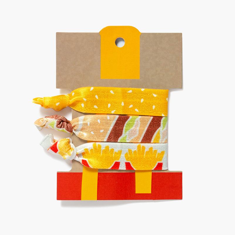 set of three hair ties in sesame seed, burger, and French fry print