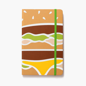 multi-color journal with close-up of Big Mac sandwich layers and green elastic strap closure